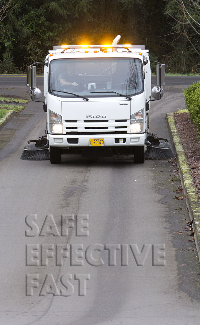 A Tymco 435 street sweeper at work